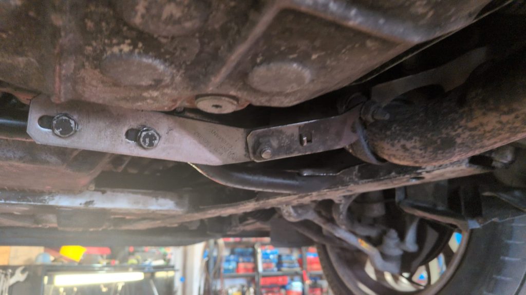 Car undergoing an MOT test at Pit-Air Motors in Croydon